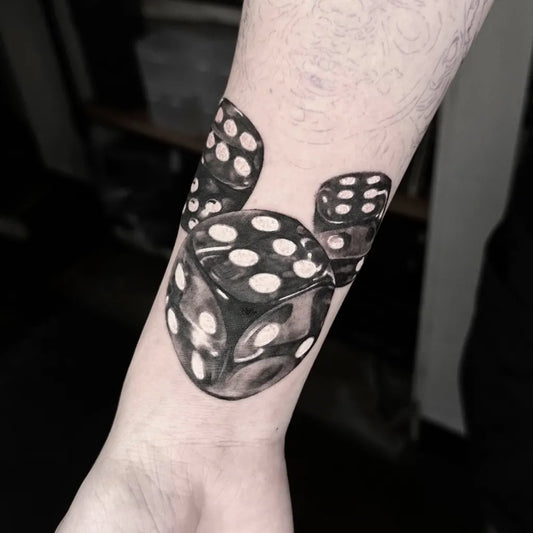 Medium Black and Grey Dice Tattoo on Men Wrist by @showhand.paul