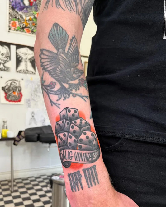 Medium Black and Grey Dice and Bird Tattoo on Men Arm by @victor_aka_chili