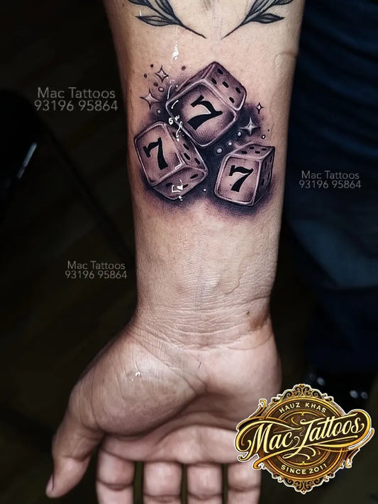 Medium Black and Grey Dice and Wings Tattoo on Men Forearm by @mac_tattoos_original