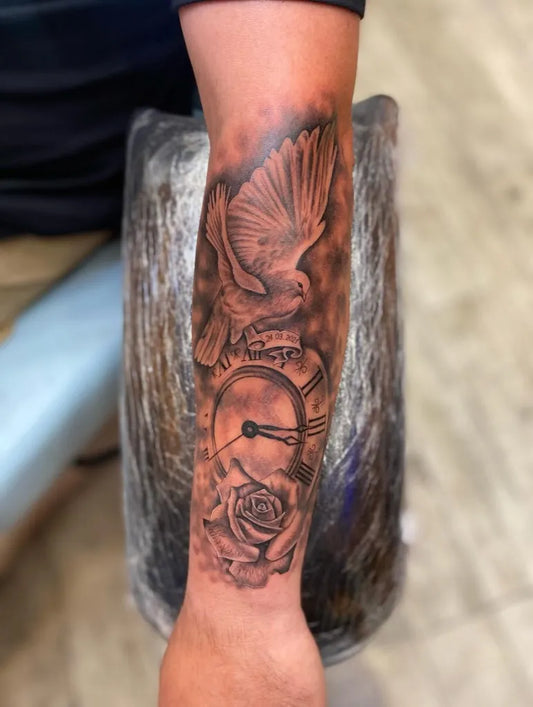 Medium Black and Grey Dove Clock Rose Tattoo on Men Arm by @onur_tattooer