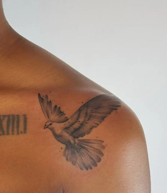 Medium Black and Grey Dove Tattoo on Men Shoulder by @hyperink.ca