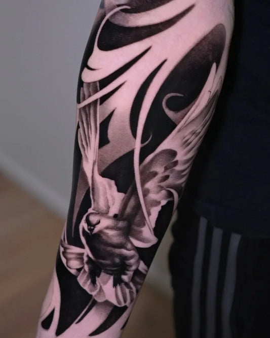 Medium Black and Grey Dove Wings Tattoo on Men Arm by @veronica_orlov