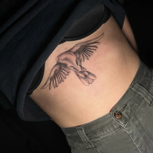 Medium Black and Grey Dove with Wings Tattoo on Women Back by @heliast.tattoos