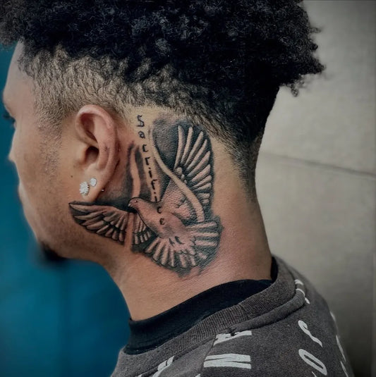 Medium Black and Grey Dove with Wings and Text Tattoo on Men Neck by @quinns.ink