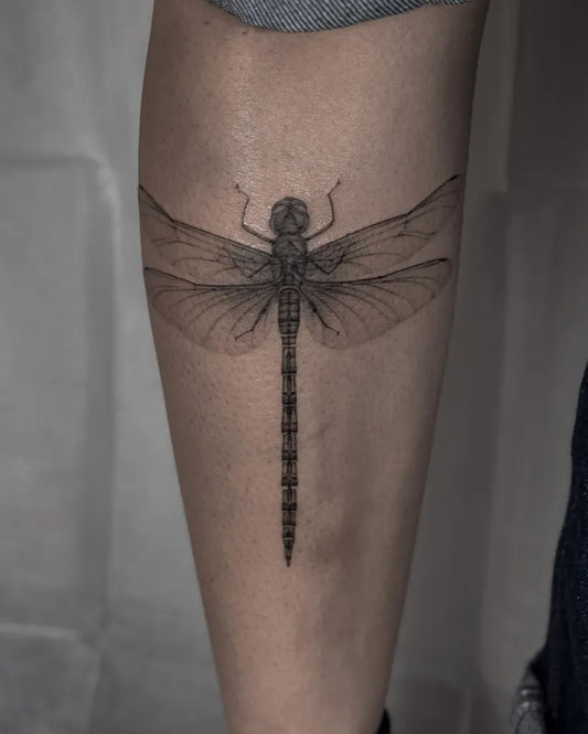 Medium Black and Grey Dragonfly on Men Leg Tattoo by @kavi_tattoo