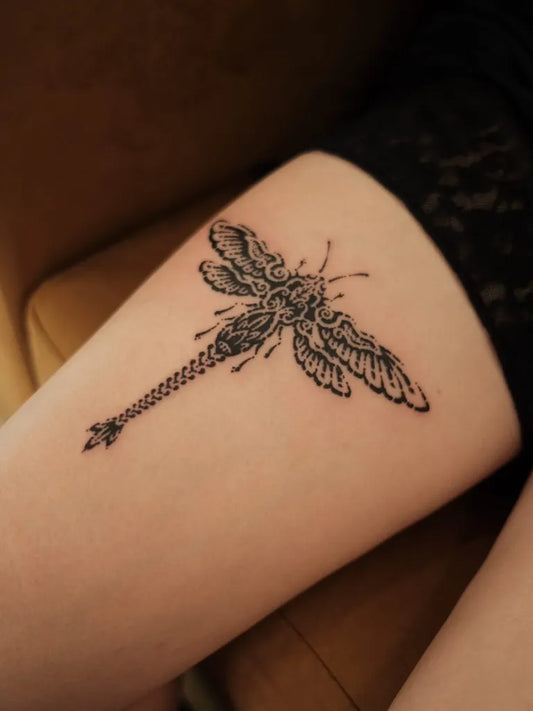 Medium Black and Grey Dragonfly on Women Thigh Tattoo by @put.ink_