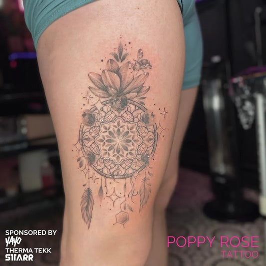 Medium Black and Grey Dream Catcher Flowers Tattoo on Women Thigh by @poppyrosetattoo