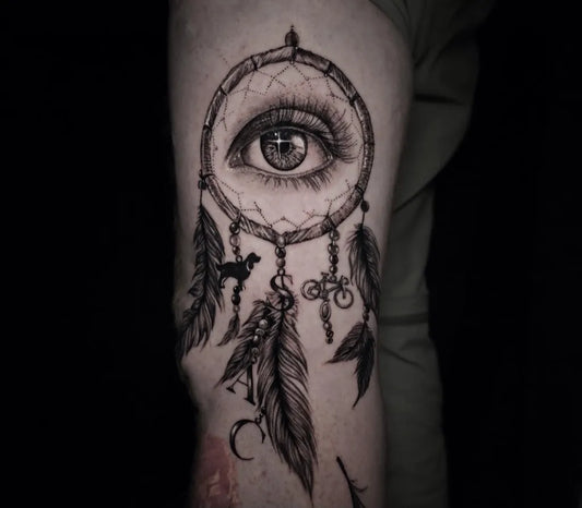 Medium Black and Grey Dream Catcher with Eye Tattoo on Men Arm by @primadonna_ink