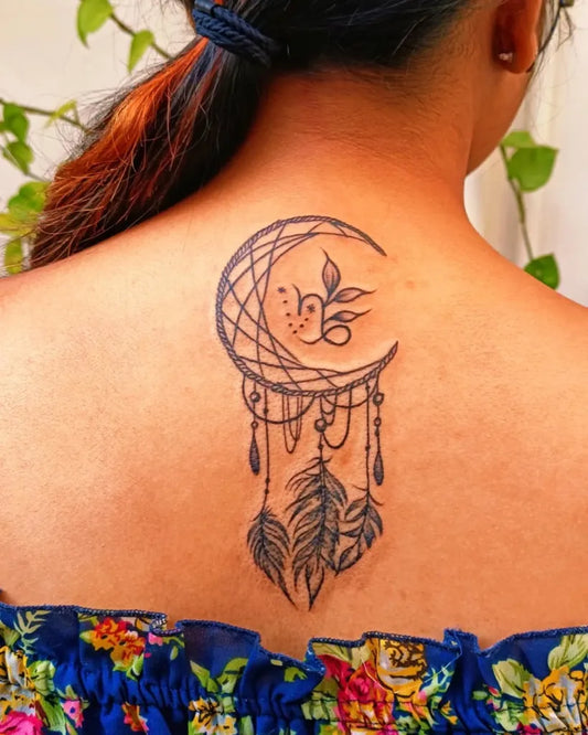 Medium Black and Grey Dream Catcher with Moon and Feathers Tattoo on Women Back by @dot_to_dot96tattoos