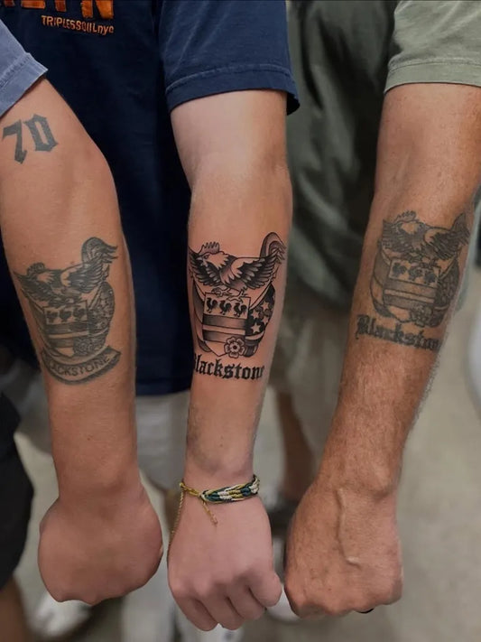 Medium Black and Grey Eagle Shield Tattoo on Men Arm by @highstreettattoo