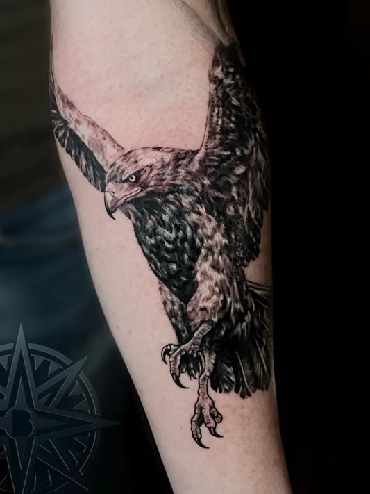 Medium Black and Grey Eagle Tattoo on Men Arm by @babilontattookilkenny