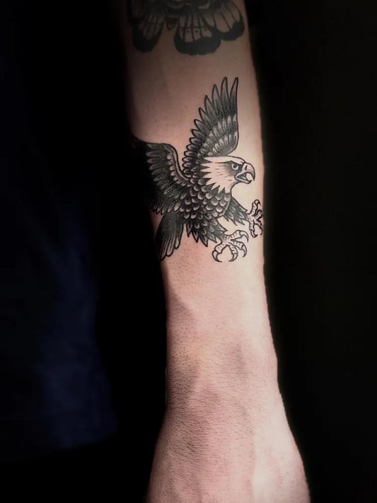 Medium Black and Grey Eagle Tattoo on Men Arm by @badmonkey_tattoo