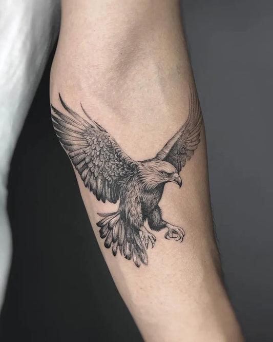 Medium Black and Grey Eagle Tattoo on Men Arm by @hzatattoo