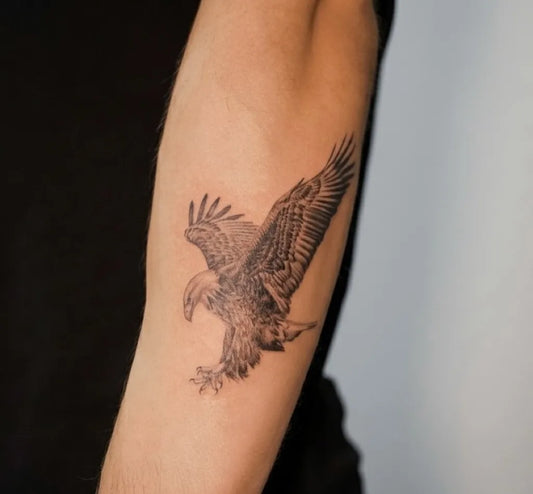 Medium Black and Grey Eagle Tattoo on Men Arm by @indira_txttoos