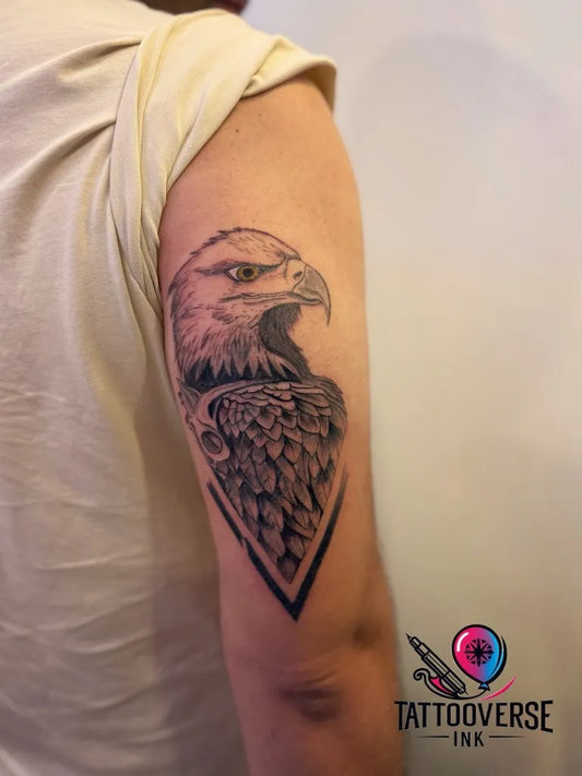 Medium Black and Grey Eagle Tattoo on Men Arm by @tattooverseink