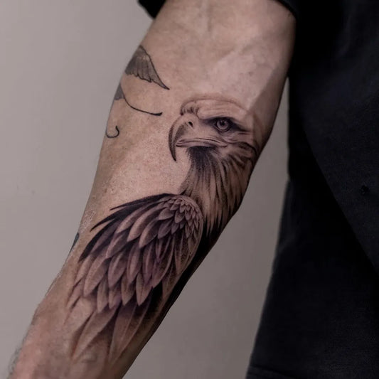 Medium Black and Grey Eagle Tattoo on Men Arm by @vinking.art