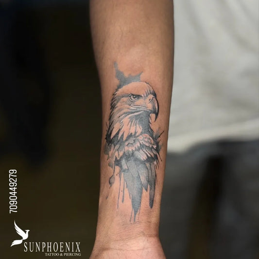 Medium Black and Grey Eagle Tattoo on Men Wrist by @sunphoenix_tattoo_studio