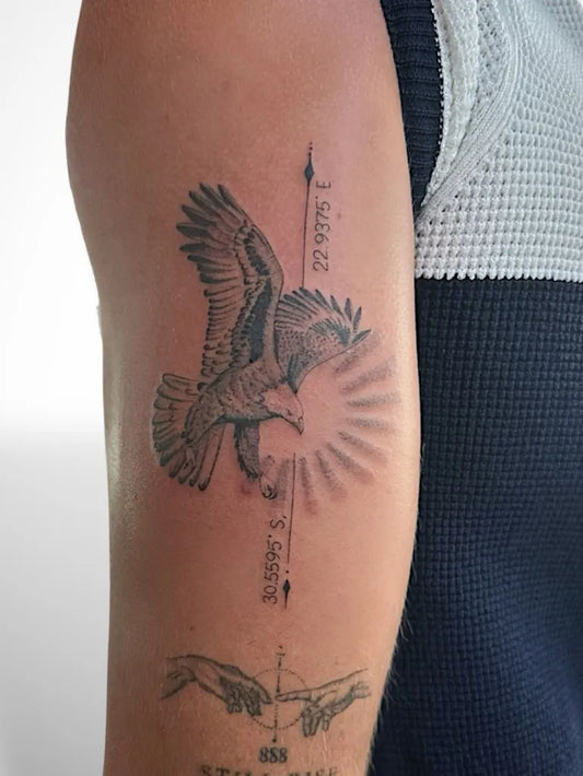 Medium Black and Grey Eagle with Compass Tattoo on Men Arm by @eth.ink