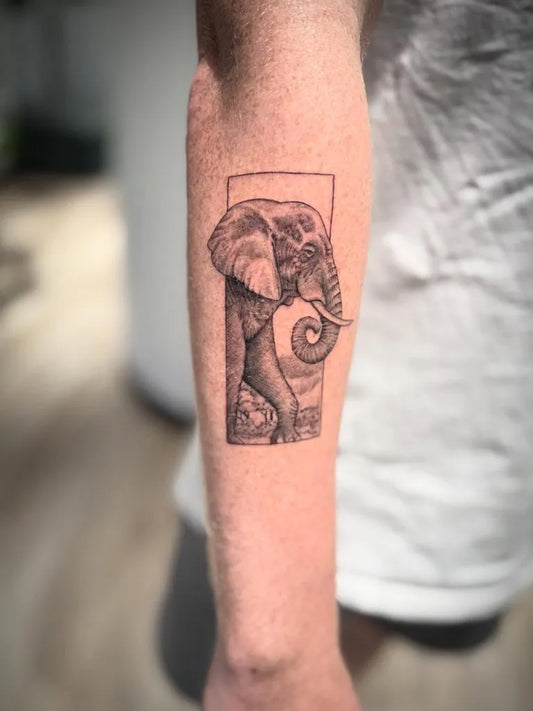 Medium Black and Grey Elephant Tattoo on Men Arm by @johnb.designs