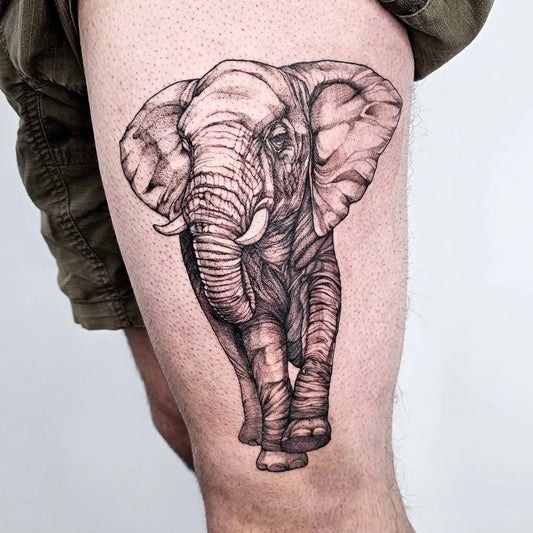 Medium Black and Grey Elephant Tattoo on Men Thigh by @aquarian_tattoo