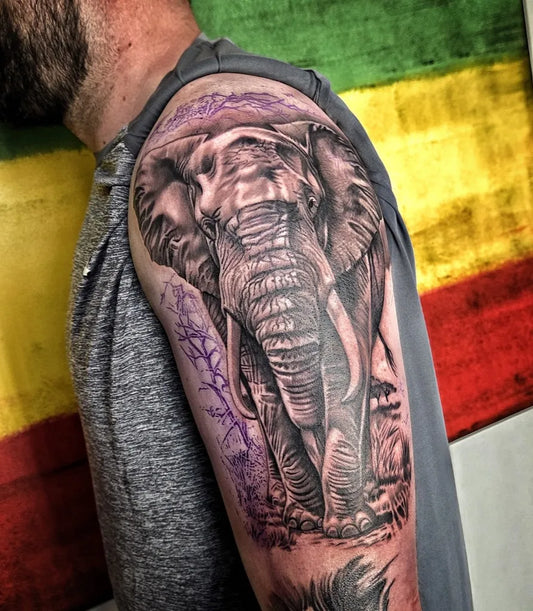 Medium Black and Grey Elephant and Branches Tattoo on Men Shoulder by @scribbleink