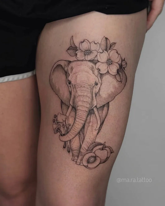 Medium Black and Grey Elephant with Flowers Tattoo on Women Thigh by @ma.ra.tattoo