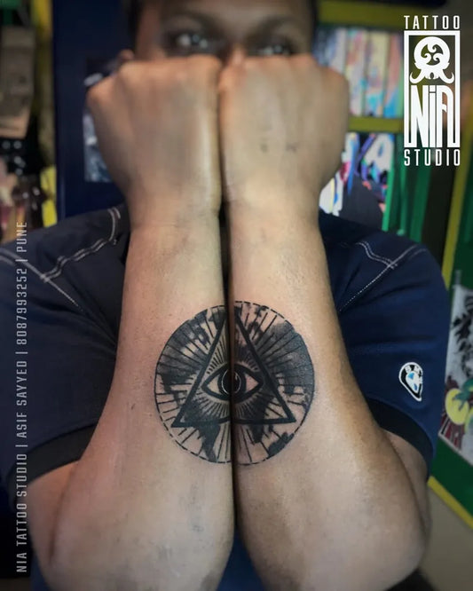 Medium Black and Grey Evil Eye Pyramid on Men Forearm Tattoo by @niatattoostudio