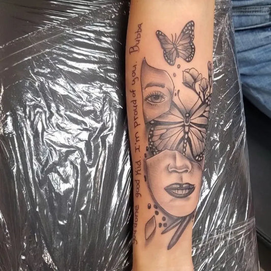 Medium Black and Grey Face with Butterfly and Dandelion Tattoo on Women Arm by @tattooersteven