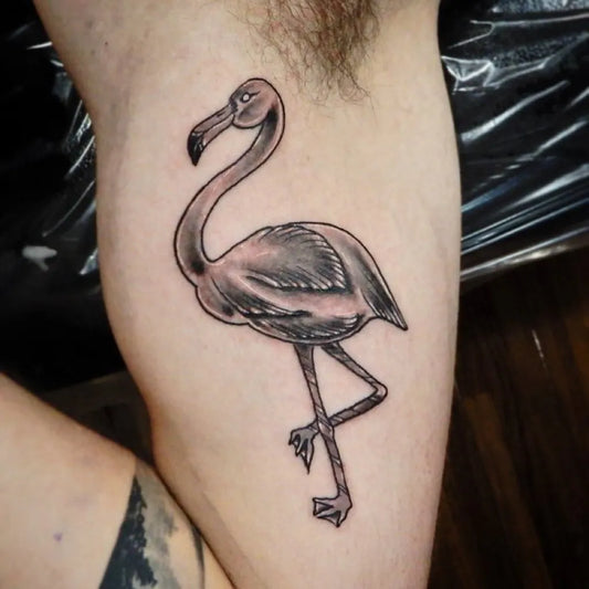 Medium Black and Grey Flamingo Tattoo on Men Thigh by @therootstattooart_okinawa
