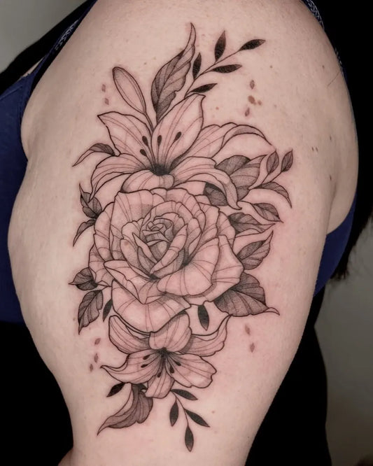 Medium Black and Grey Floral Bouquet Tattoo on Women Upper Arm by @helle.ink