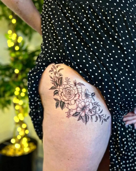 Medium Black and Grey Flower Bouquet Tattoo on Women Hip by @aaronjtattoo