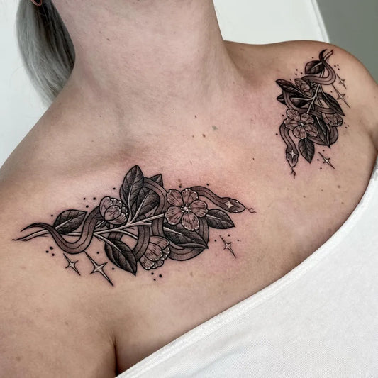 Medium Black and Grey Flowers and Snake Tattoo on Women Collarbone by @caseymarietattoo