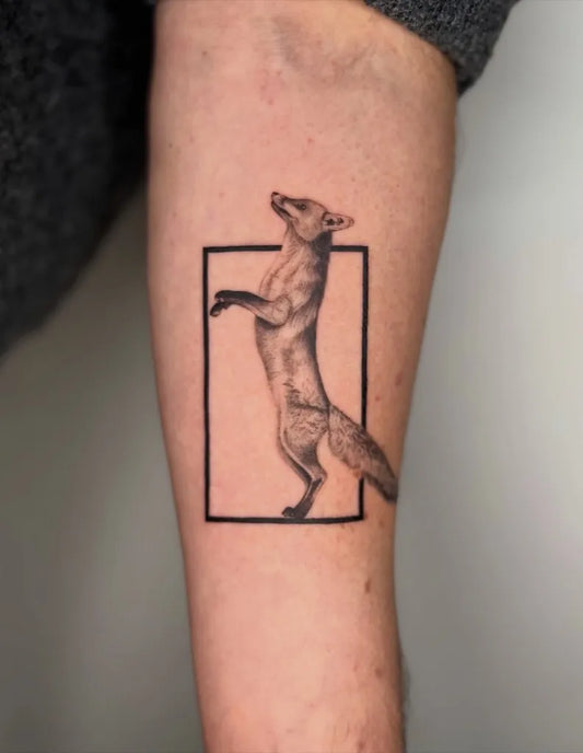 Medium Black and Grey Fox Tattoo on Women Arm by @bluebell.tatts