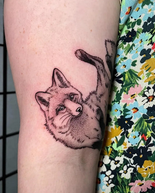 Medium Black and Grey Fox Tattoo on Women Arm by @caravanessa.tattoo