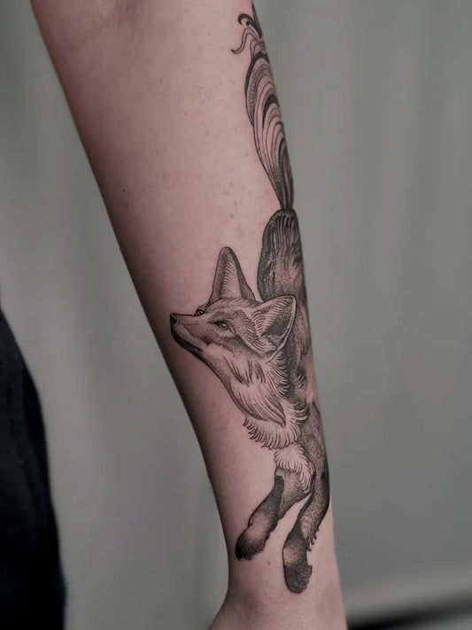 Medium Black and Grey Fox Tattoo on Women Arm by @hannahfisher_tattoo