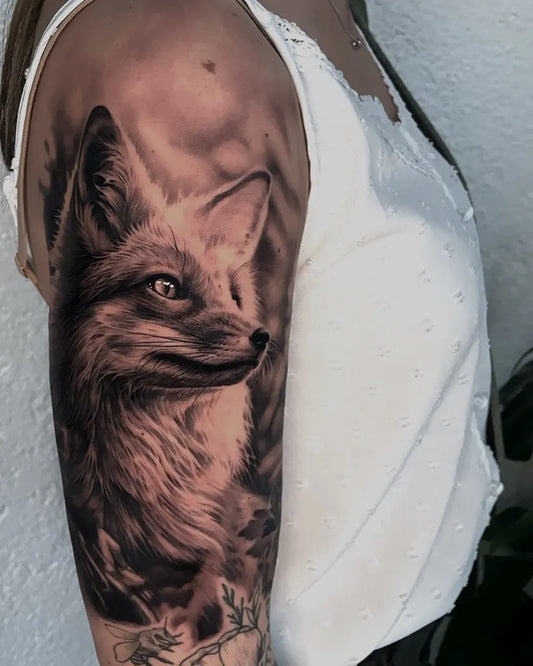 Medium Black and Grey Fox Tattoo on Women Shoulder by @th_lukas_falkner