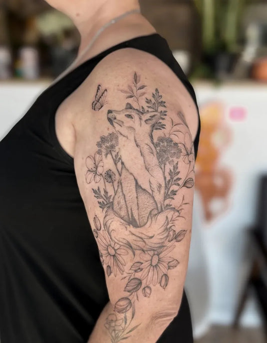 Medium Black and Grey Fox with Flowers Tattoo on Women Arm by @finelinebaddie