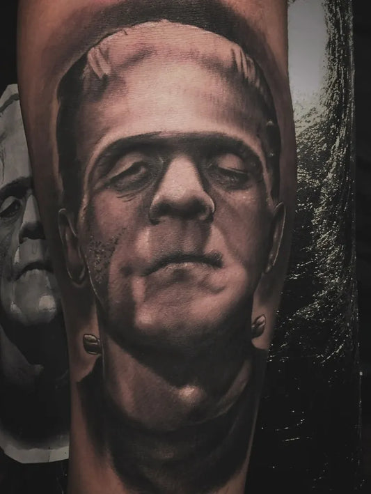 Medium Black and Grey Frankenstein Monster Horror Tattoo on Men Arm by @rayangulotattoo
