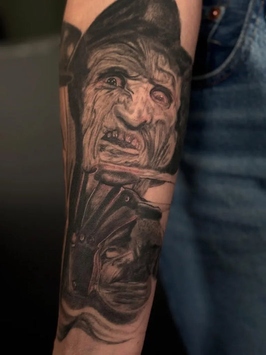 Medium Black and Grey Freddy Krueger Horror Tattoo on Men Arm by @undertheskin_kevin_goebel