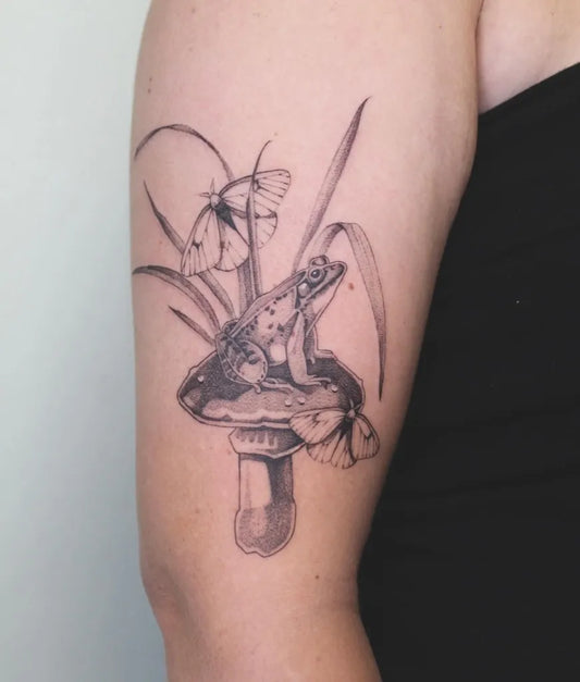 Medium Black and Grey Frog and Mushroom on Women Arm Tattoo by @jesskuespert