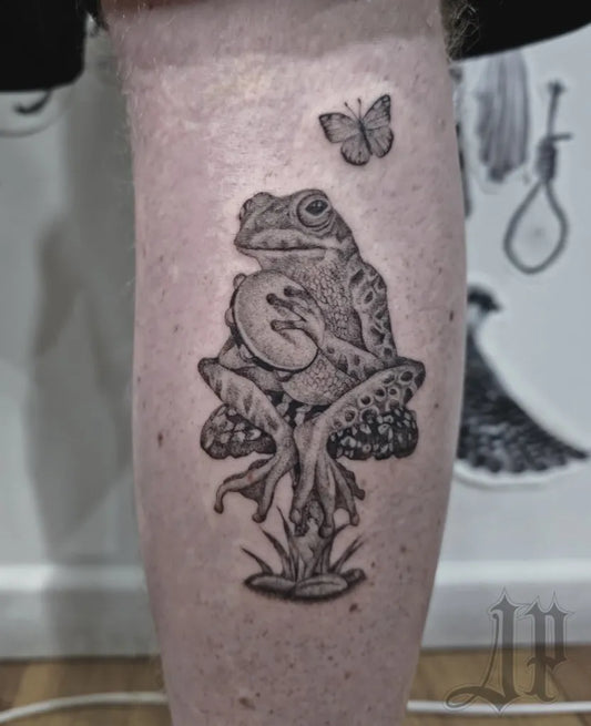 Medium Black and Grey Frog with Butterfly Tattoo on Men Leg by @jack_padointattoo