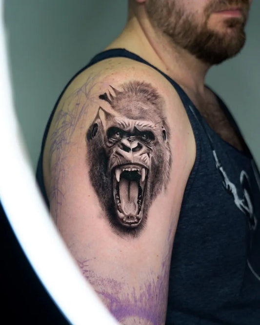 Medium Black and Grey Gorilla Tattoo on Men Arm by @kindsoul.tattoos