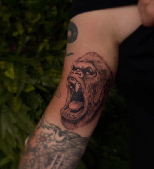 Medium Black and Grey Gorilla Tattoo on Men Arm by @mattegantattoo