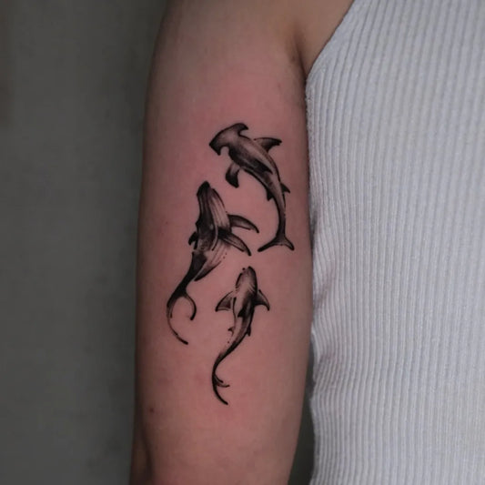 Medium Black and Grey Hammerhead Sharks on Women Arm Tattoo by @stevannyjack