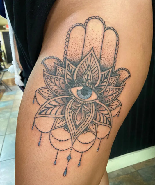 Medium Black and Grey Hamsa Lotus Evil Eye on Women Thigh Tattoo by @lizglitztattoo