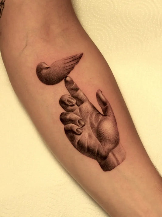 Medium Black and Grey Hand Holding Dove Tattoo on Men Arm by @eddie_dit