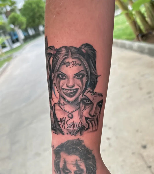 Medium Black and Grey Harley Quinn and Joker on Women Arm Tattoo by @ersindebreli_tattooer