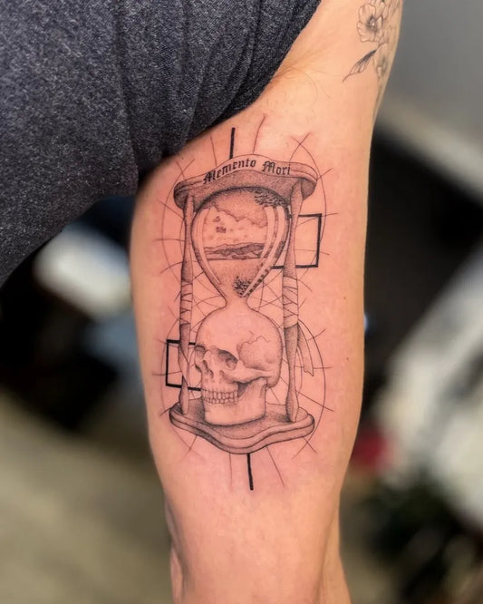 Medium Black and Grey Hourglass Skull on Men Upper Arm Tattoo by @ironsideink