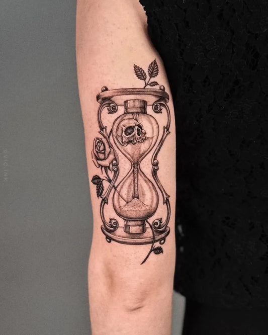 Medium Black and Grey Hourglass with Skull and Rose on Women Arm Tattoo by @vic.ink_