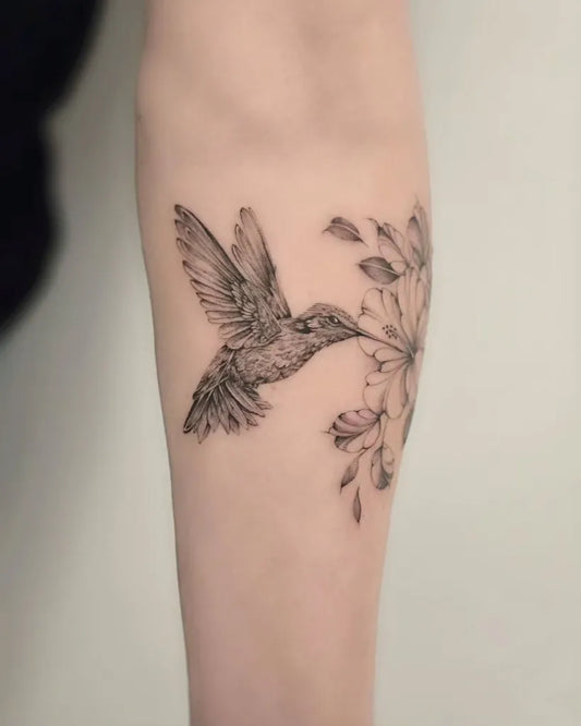 Medium Black and Grey Hummingbird and Flowers on Women Arm Tattoo by @inkspirationbb